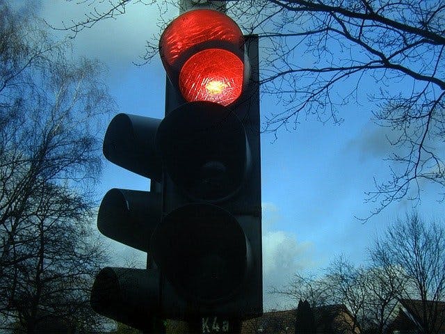 An mage of a traffic light on red 