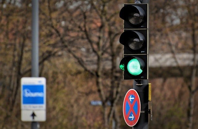 a traffic light illuminated green to show it's safe to go