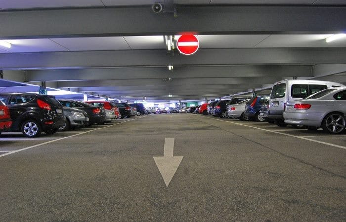 Cars parked in bays in underground car park