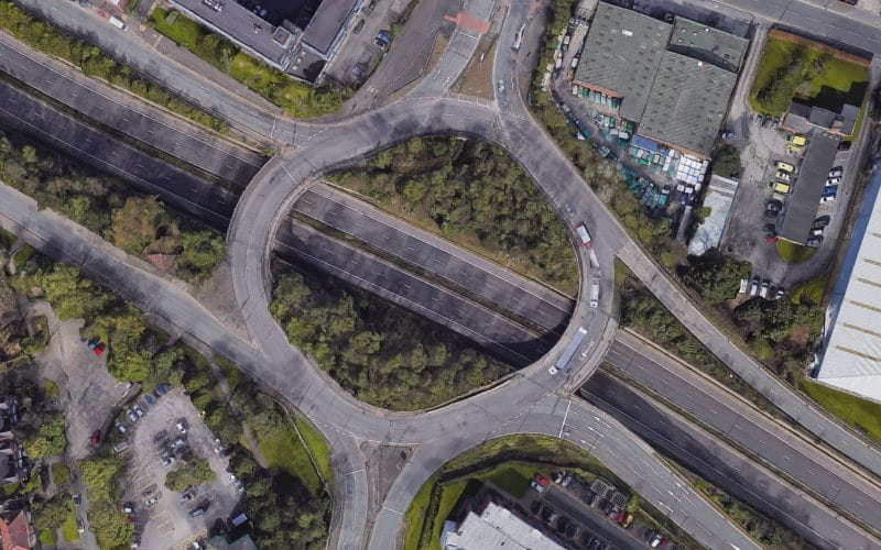 A bird's-eye view of an access-controlled roundabout in Wythenshawe.