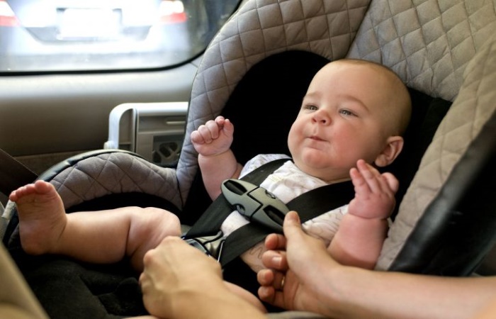 baby in child car seat