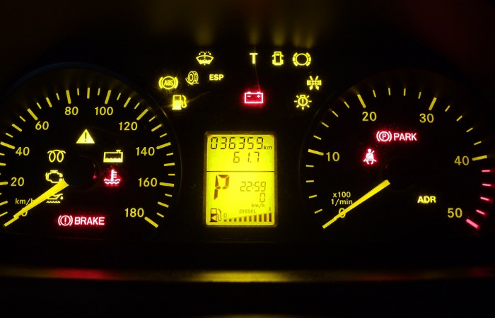 Car dashboard with warning lights