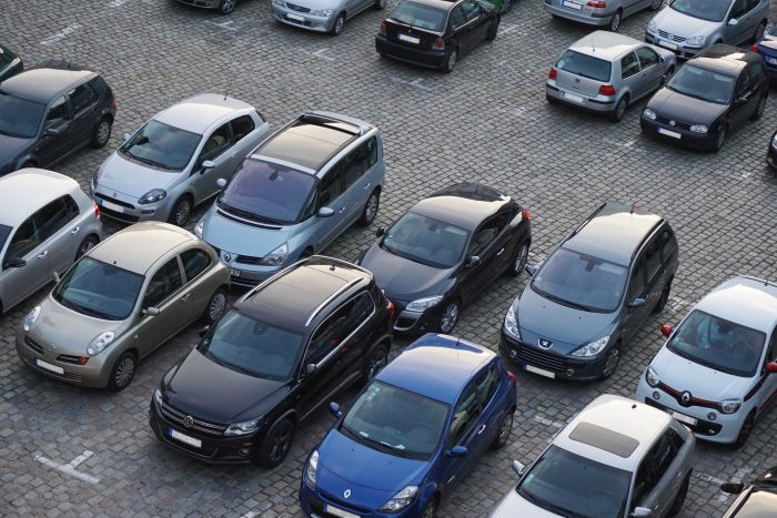 cars parked in bays in car park
