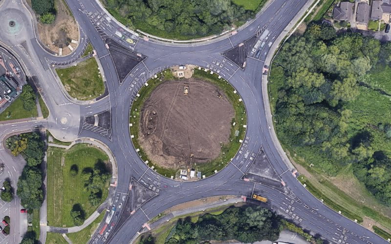 A bird's-eye view of a multi-lane roundabout in Swindon.