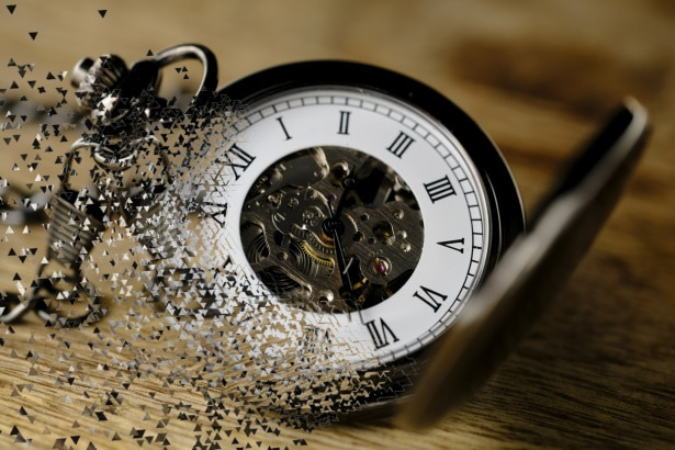 An image of a pocket watch shattering.